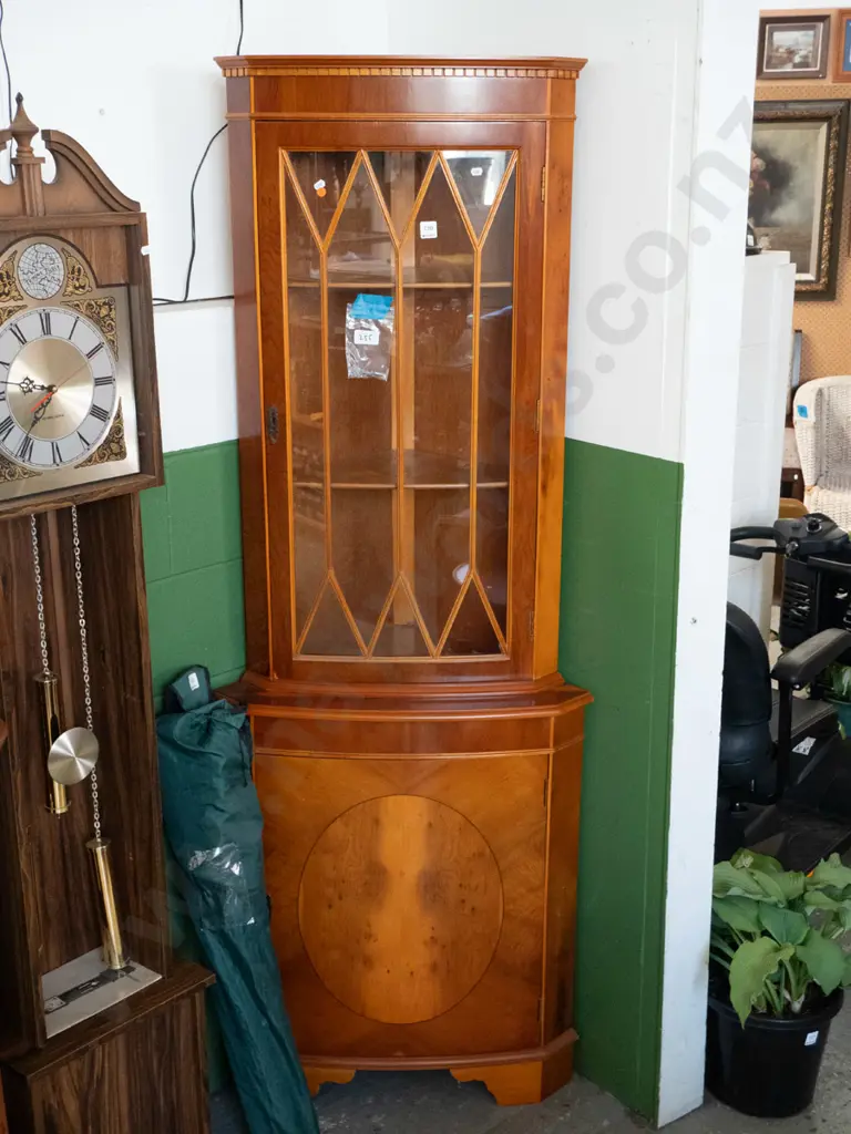 reproduction yew corner cupboard with astragal glazed top door, solid lower cupboard, 2 shelves in top, 1 in bottom Image 1++