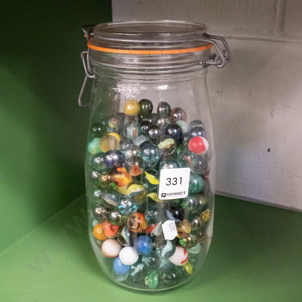 glass jar of marbles Image 1++