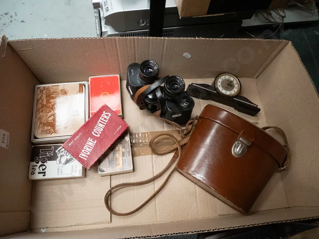 box; leather cased 8x30 binoculars, playing cards, small mantle clock etc Image 1++