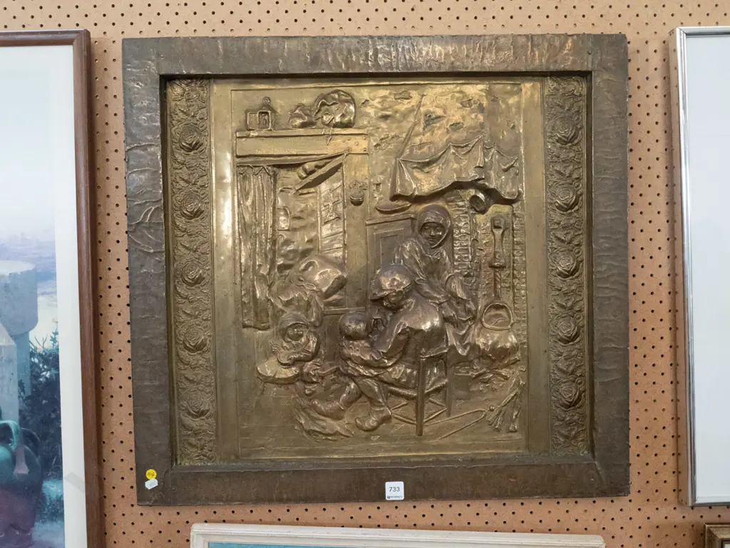 beaten brass centre to a fire screen Image 1++