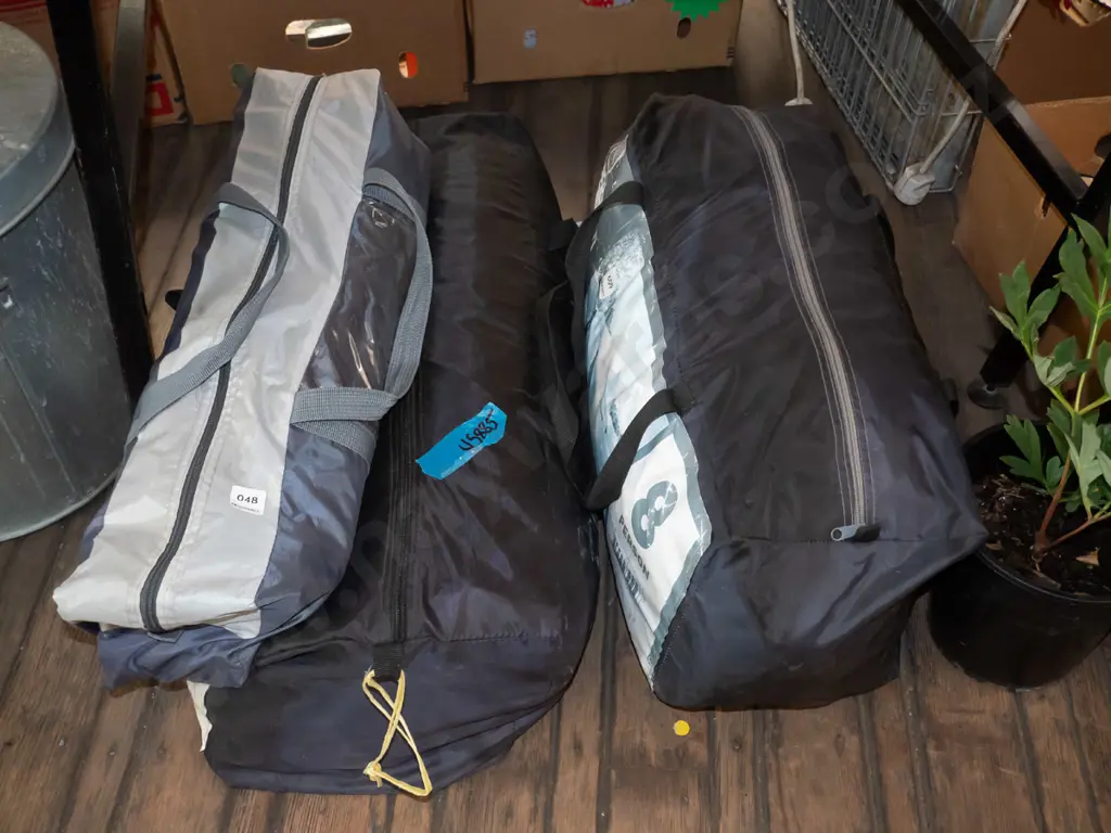 1x 8 person tent, 1x Navigator South tent - bag of poles for both Image 1++