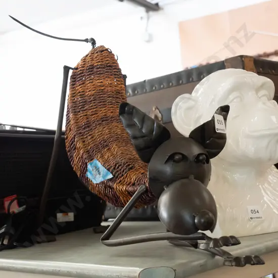 seagrass and metal dog figurine