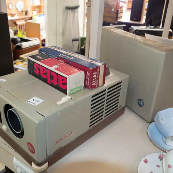 vintage slide projector and bulbs