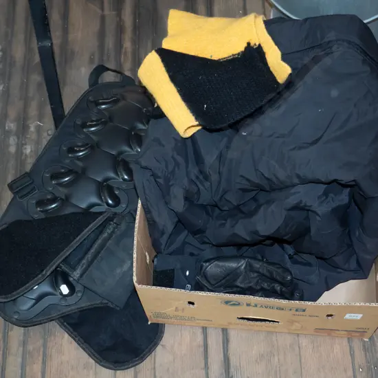 fabric and plastic spine support, scarf, gloves, large insulated ski pants