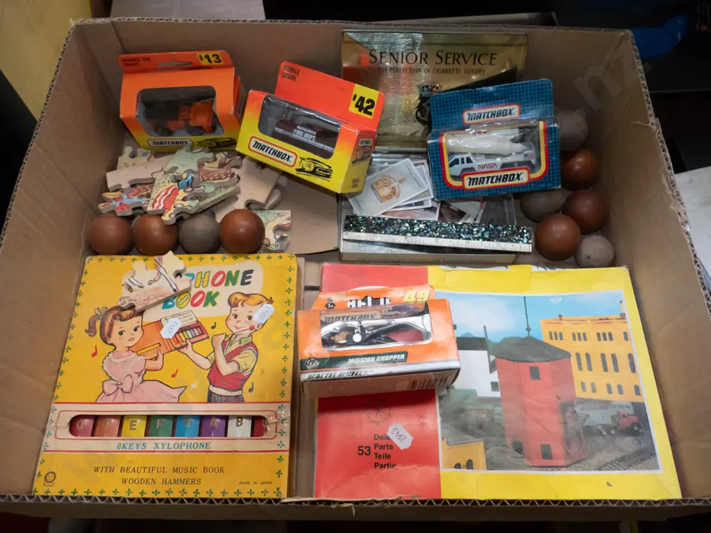 box; wooden balls, matchbox vehicles, xylophone etc Image 1++