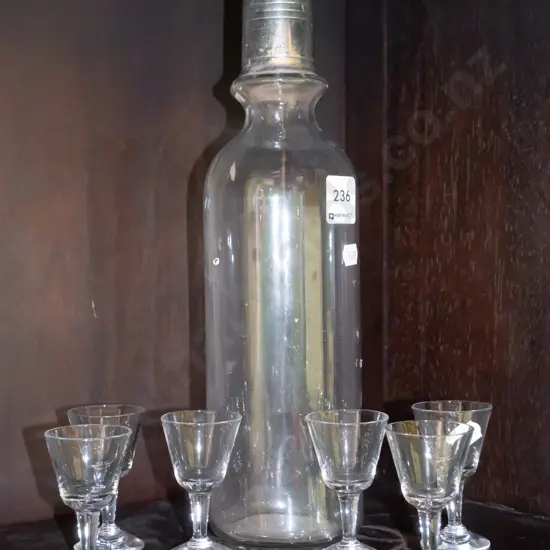 tall glass decanter and shot glasses