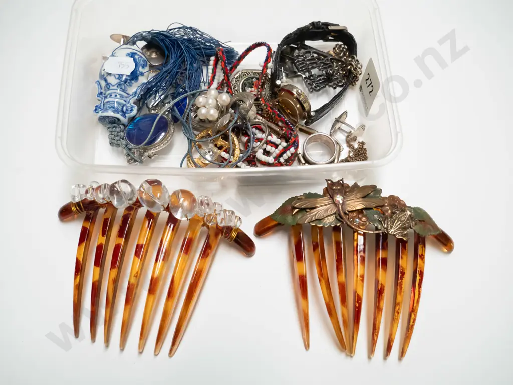 tray of hair combs, watch Image 1++