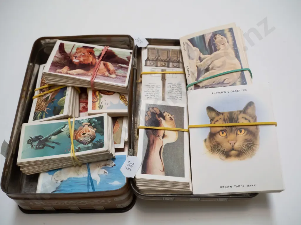 tin of collector cards Image 1++