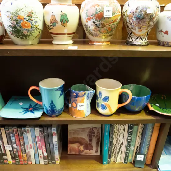 shelf; pottery, plates, bowls, cups etc