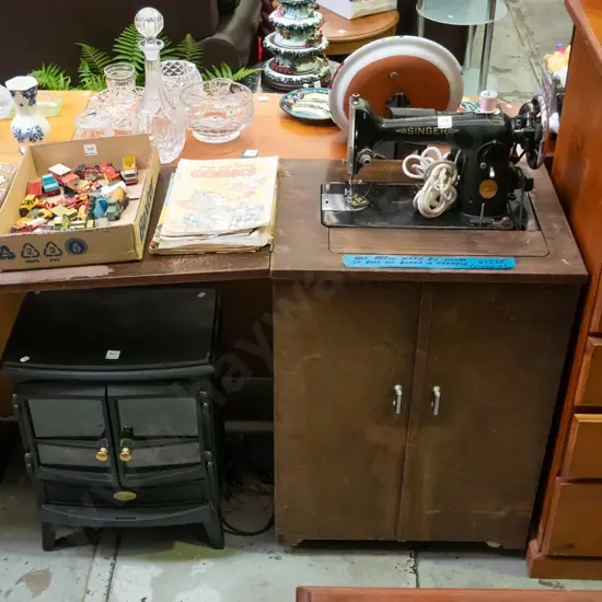 Singer treadle/electric sewing machine in cabinet - cabinet needs attention