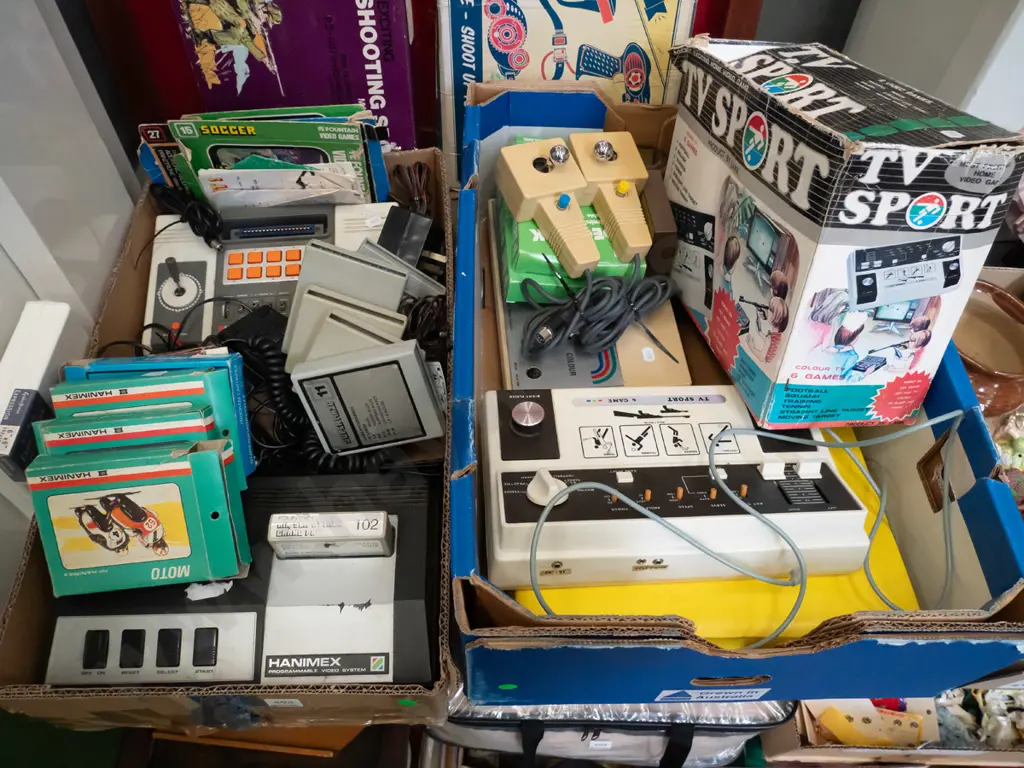 2 boxes of various Hanimex, Tempest & other home video consoles, accessories and game cartridges - As Is, No Returns Image 1++