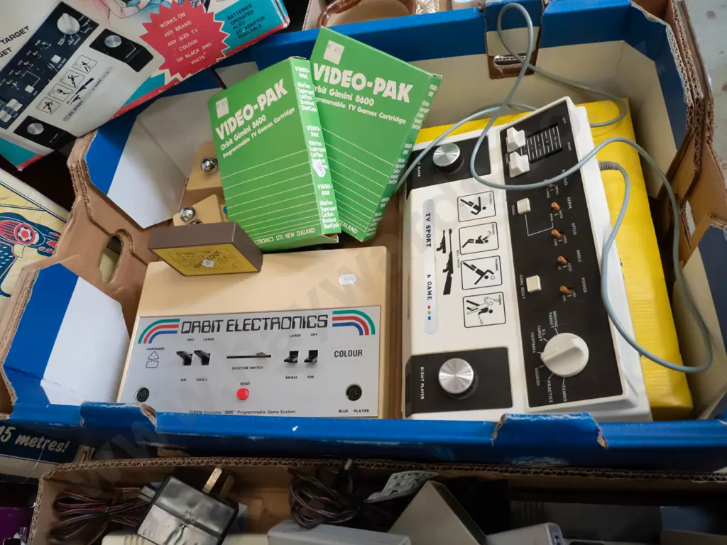 2 boxes of various Hanimex, Tempest & other home video consoles, accessories and game cartridges - As Is, No Returns Image 1++