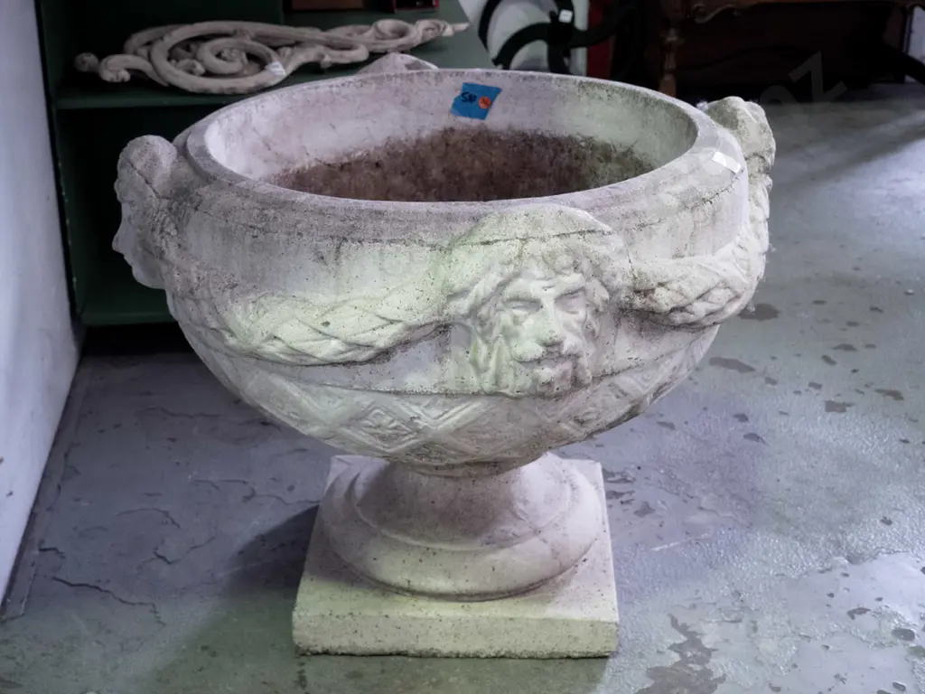large cast concrete classical style garden urn w/ intertwined swags and female heads, pedestal base on square foot - Image 1++