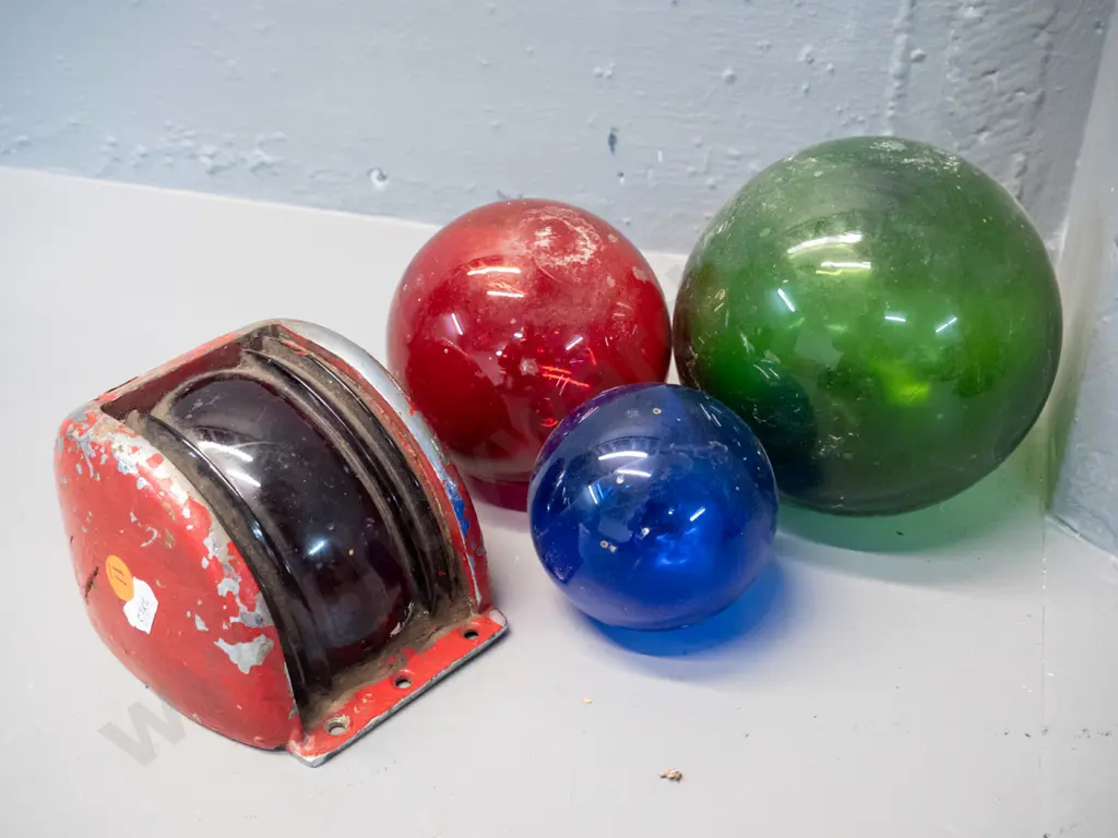 vintage cast metal port side ship light cover with red fresnel lens and 3 small coloured glass fishing floats. Some Image 1++