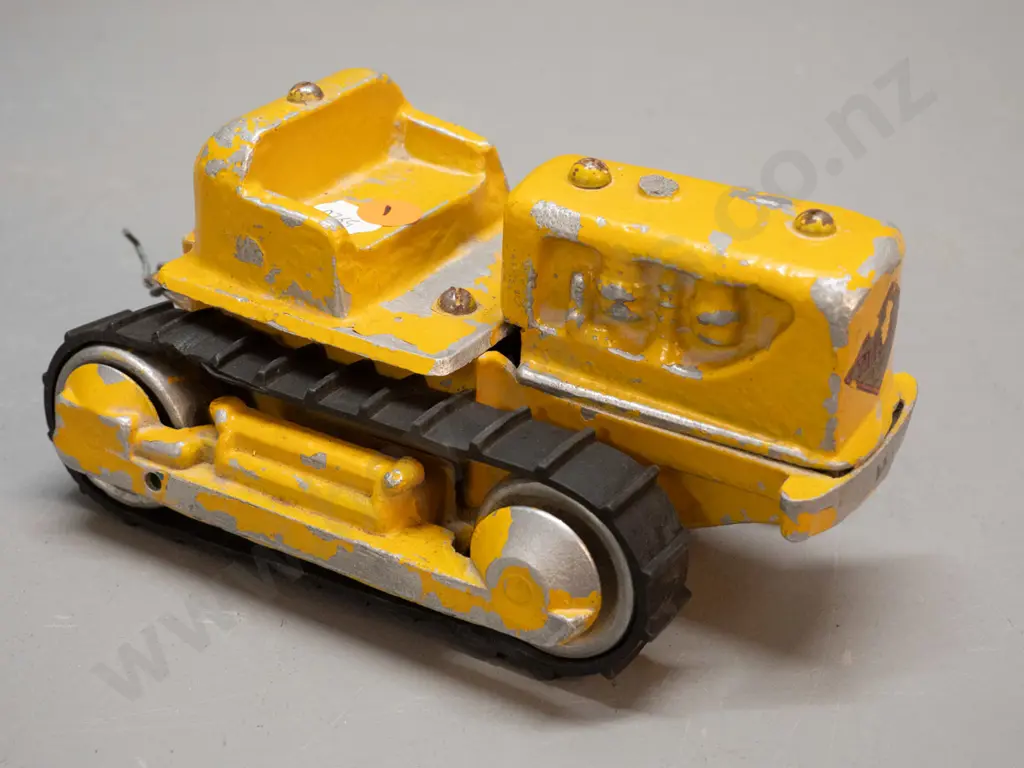 vintage Tiger Toys cast metal bulldozer - rubber tracks somewhat loose, wear to paint and logo H-100 L-200 Image 1++