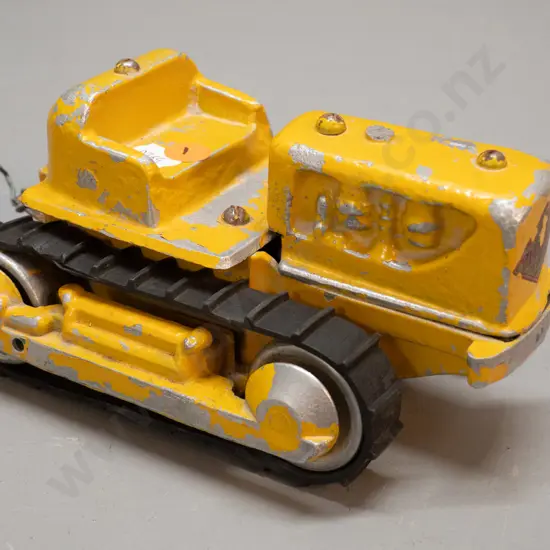 vintage Tiger Toys cast metal bulldozer - rubber tracks somewhat loose, wear to paint and logo H-100 L-200