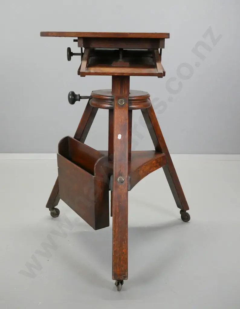 antique oak studio camera platform on tripod base with casters, metal hand crank height adjuster, locking knobs for tilt Image 1++