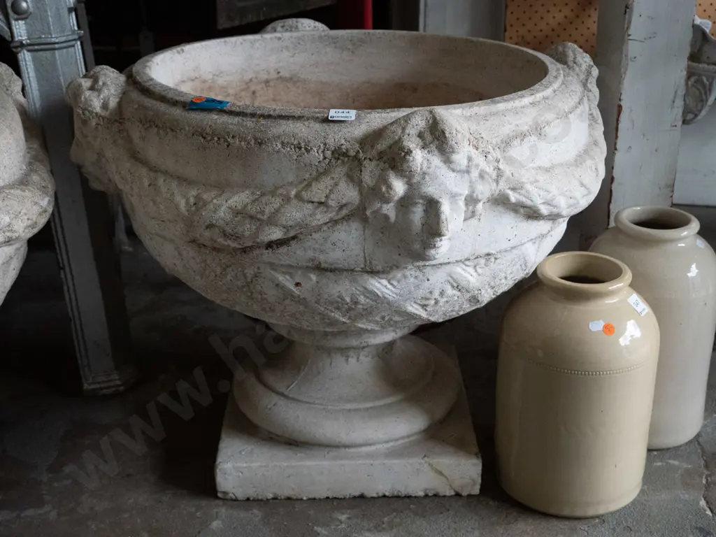 large cast concrete classical style garden urn w/ intertwined swags and female heads, pedestal base on square foot - has Image 1++