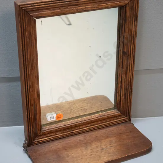 small wall hanging wood-framed mirror with flip-up hinged shelf H-260 W-210