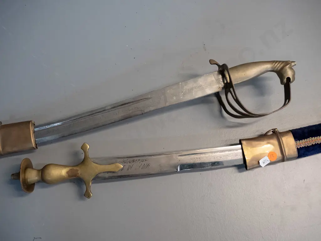two reproduction Indian souvenir sabres with brass hardware and etched blades, velvet covered scabbards, longer one L970 Image 1++