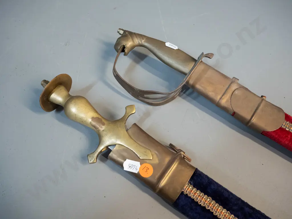 two reproduction Indian souvenir sabres with brass hardware and etched blades, velvet covered scabbards, longer one L970 Image 1++
