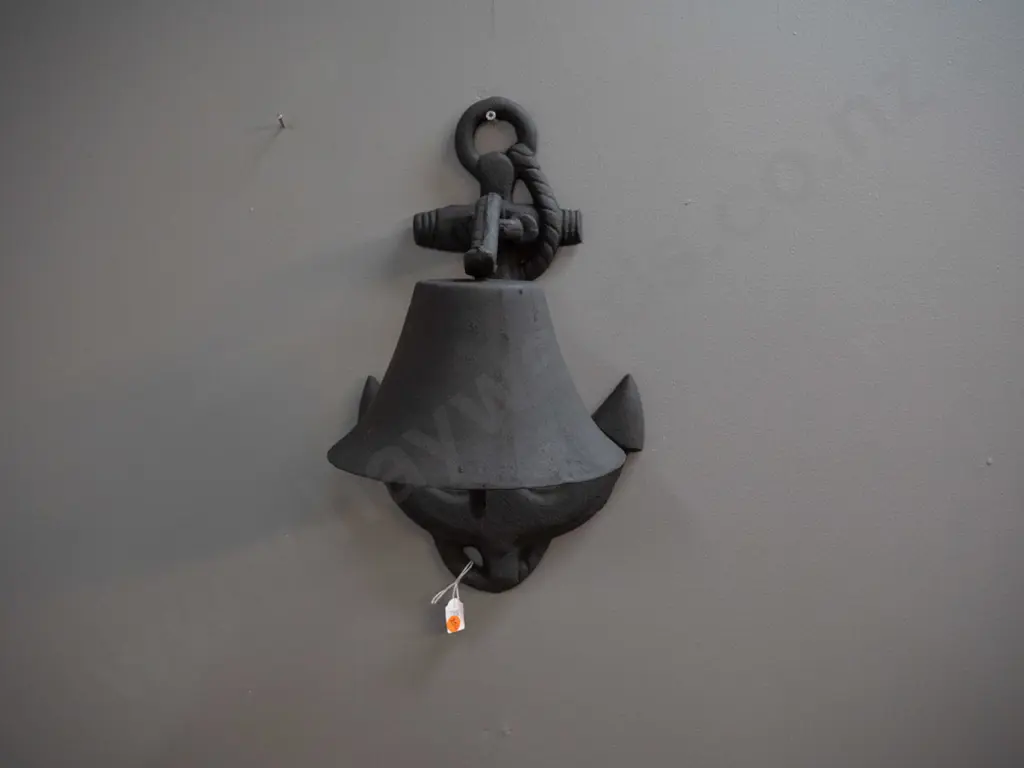 heavy cast iron wall mount bell on anchor shaped wall bracket - clapper somewhat stiff, has no cord H-400 W-250 Bell Image 1++