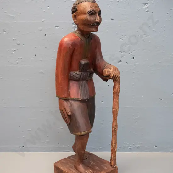 Chinese carved timber figure of man with walking stick H-500