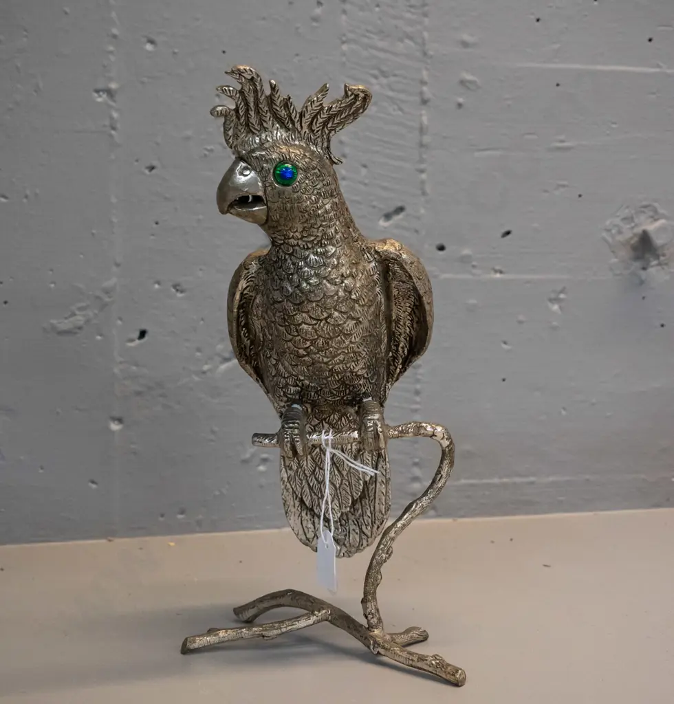 brass finish metal figure of a cockatoo with blue-green glass eyes perched on branch H-270 Image 1++