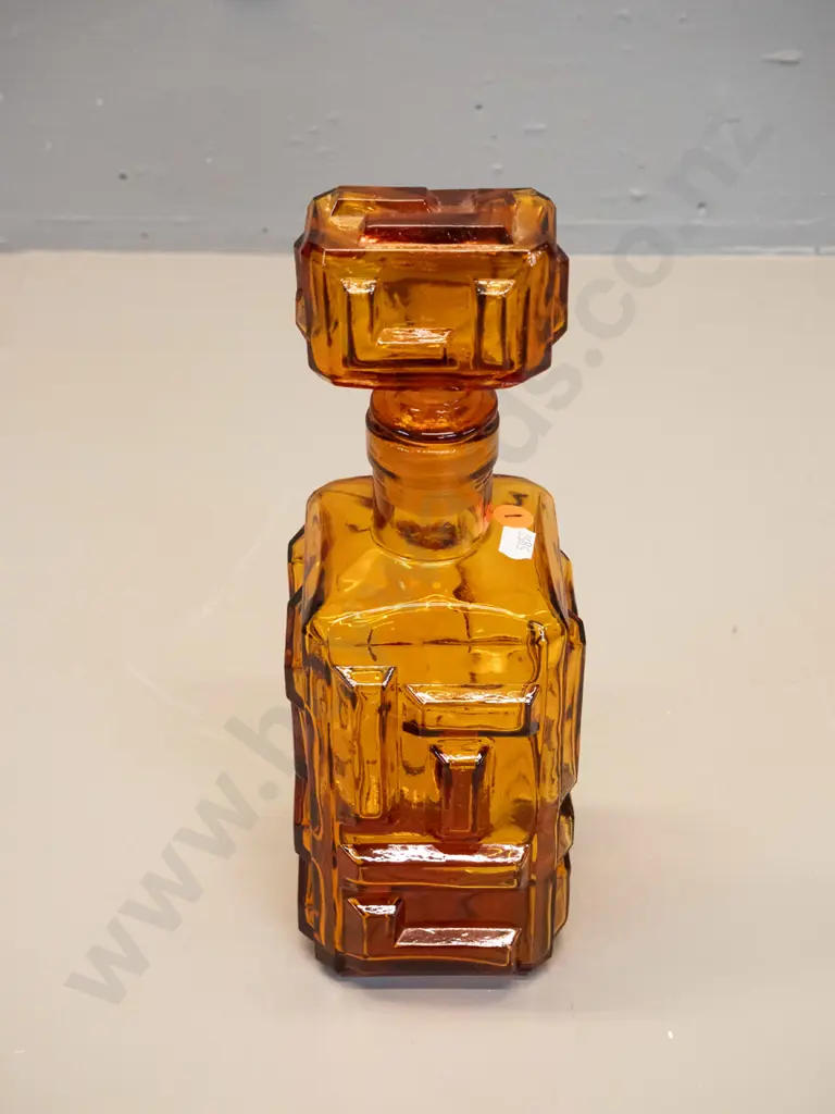 retro Empoli Italy moulded amber glass geometric block pattern stoppered decanter. Minor damage to plastic Image 1++