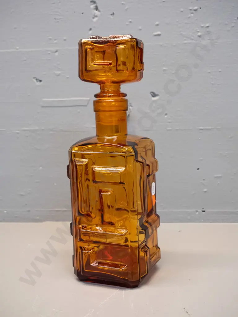 retro Empoli Italy moulded amber glass geometric block pattern stoppered decanter. Minor damage to plastic Image 1++