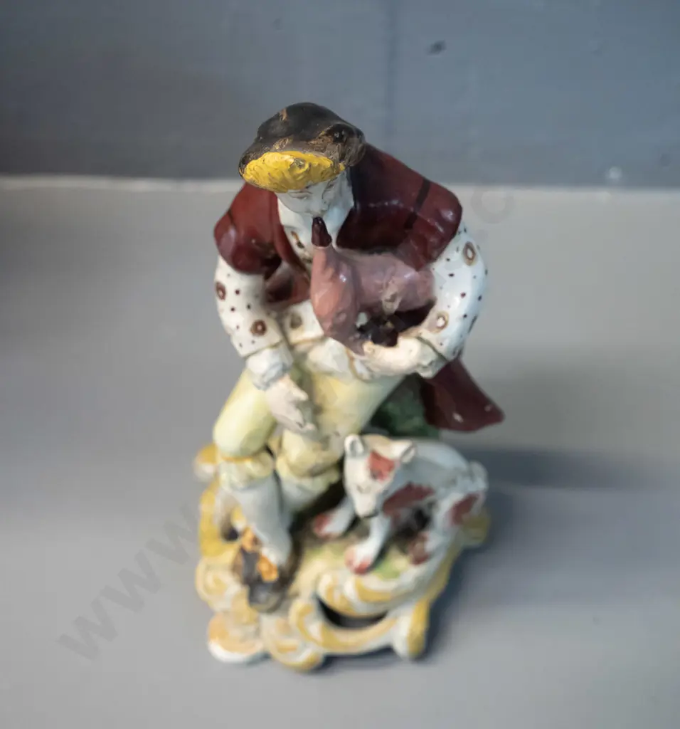 small figurine of man playing bagpipes - has been marked on base "Chelsea Derby circa 1785" - some damage to pipes H-160 Image 1++