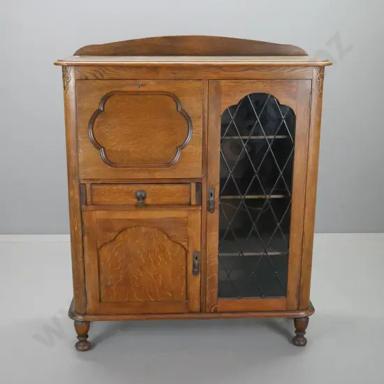 vintage deco oak bookcase / writing desk with single diamond leadlight door, single drawer and lower cupboard, interior