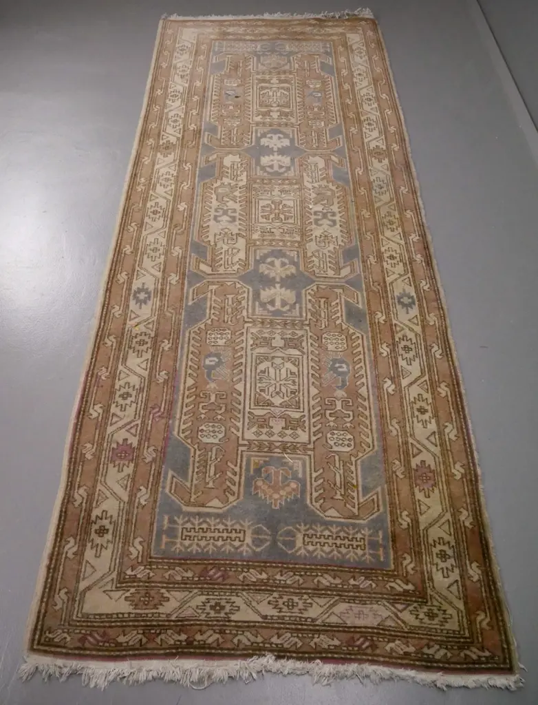 hand-knotted Persian style wool floor rug - light browns and blue, reds have faded away, has staining L-2950 W-1100 Image 1++