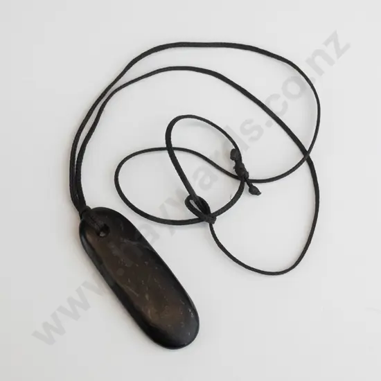 greenstone pendant on fine leather strand