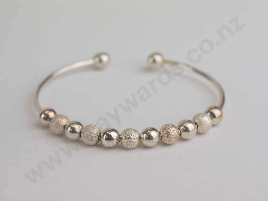 small silver bangle with silver beads stamped 925 Image 1++