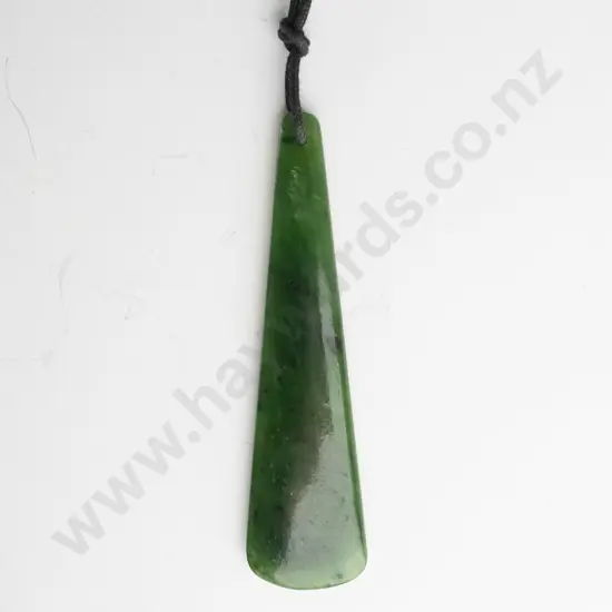 greenstone pendant on leather