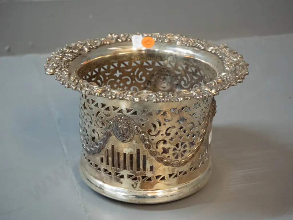 plated pierced wine bottle coaster - Adams style with swags and lion's heads - on turned wooden base, some wear to Image 1++