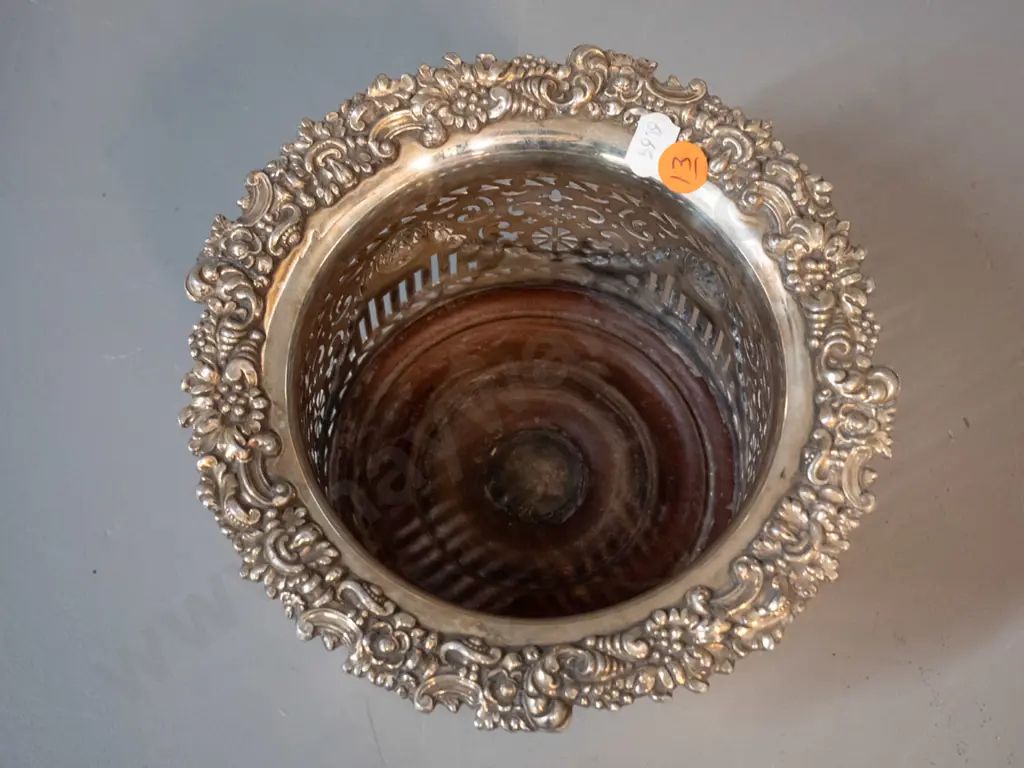 plated pierced wine bottle coaster - Adams style with swags and lion's heads - on turned wooden base, some wear to Image 1++