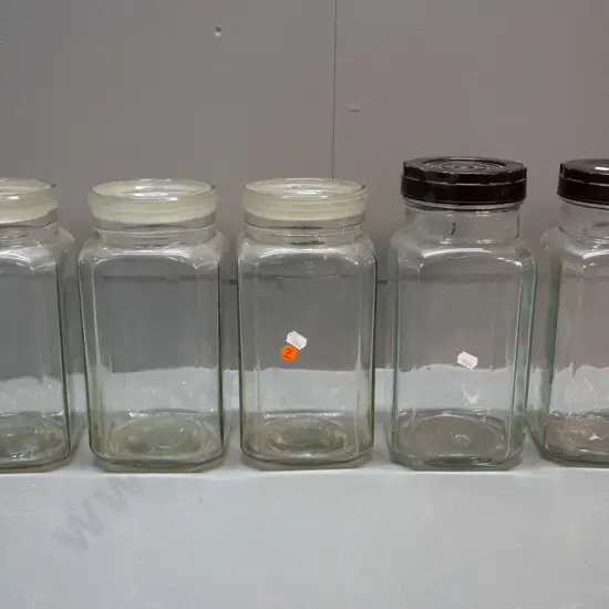 5 vintage glass confectionary / kitchen storage jars - 2 with bakelite lids, 3 w/ glass, 2 are stuck in place. Glass