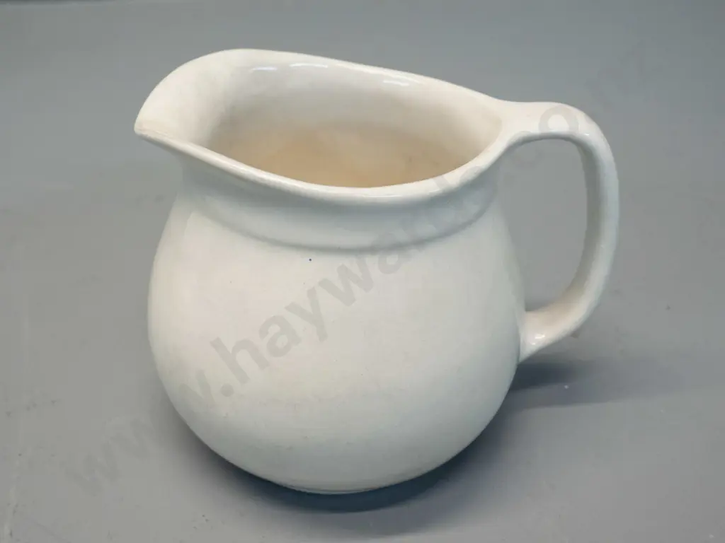 Crown Lynn jug with tiki mark - some crazing inside H-95 W-120 Image 1++