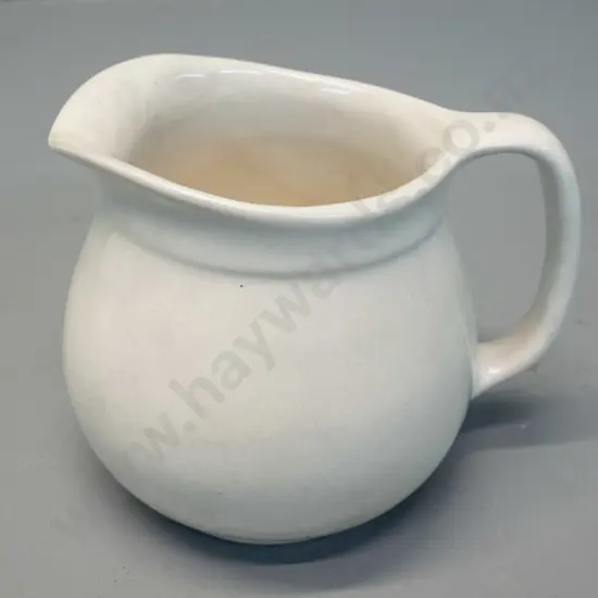 Crown Lynn jug with tiki mark - some crazing inside H-95 W-120