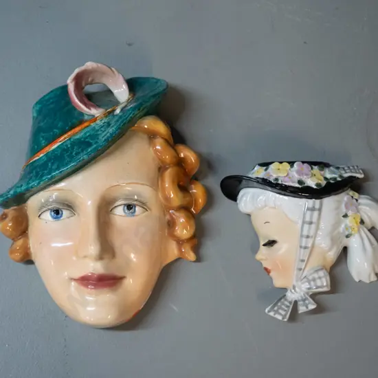 2 wall hanging china items - retro pocket vase and a deco style woman's head marked FX on back H-180 W-150