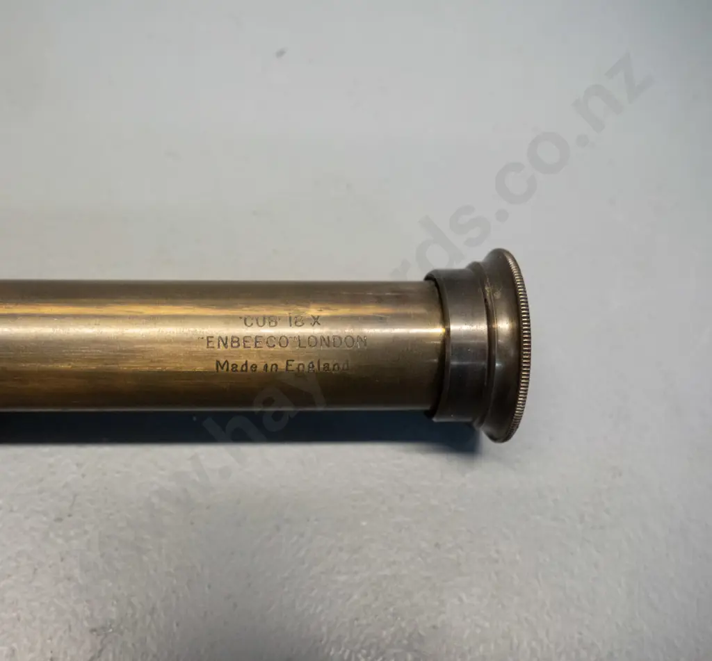 vintage brass telescope with leather covering, slip on lens cover, marked "Cub" 18x Enbeeco London. L-175 closed, L-435 Image 1++