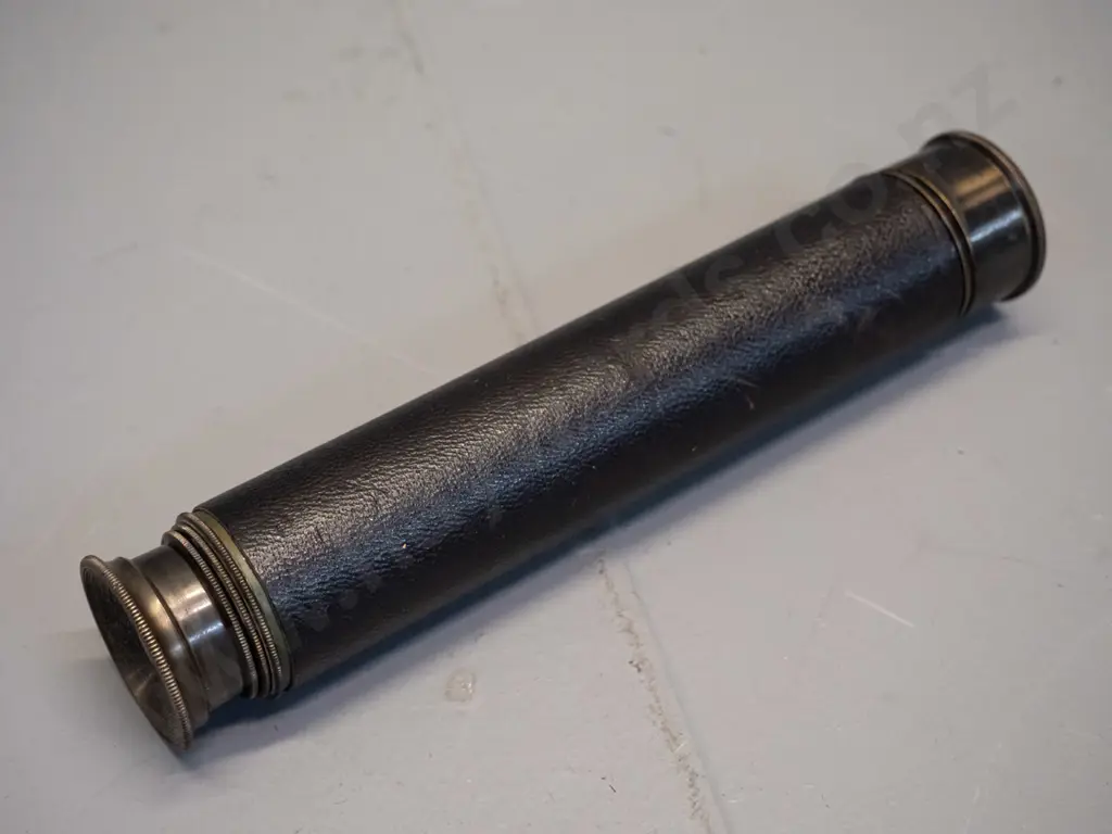 vintage brass telescope with leather covering, slip on lens cover, marked "Cub" 18x Enbeeco London. L-175 closed, L-435 Image 1++