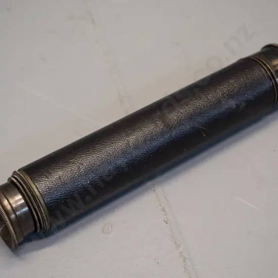 vintage brass telescope with leather covering, slip on lens cover, marked "Cub" 18x Enbeeco London. L-175 closed, L-435