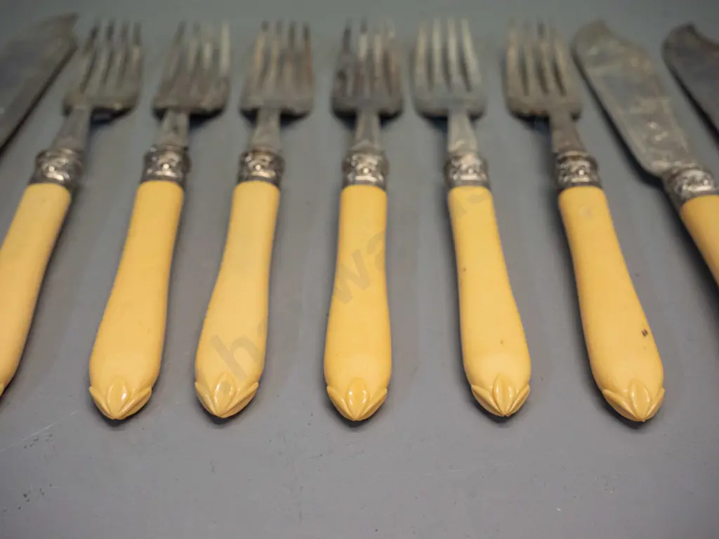 set of 6 faux ivory handled engraved plated fish knives and forks with sterling silver bands Image 1++