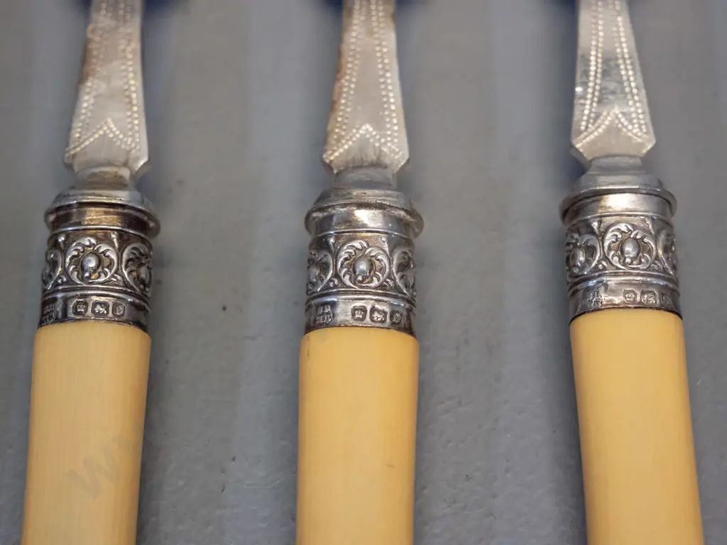set of 6 faux ivory handled engraved plated fish knives and forks with sterling silver bands Image 1++