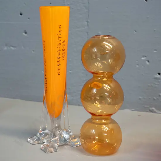 2 glass items - clear based orange 1925-26 South Seas Exhibition souvenir H-200, a thin bubble shape vase
