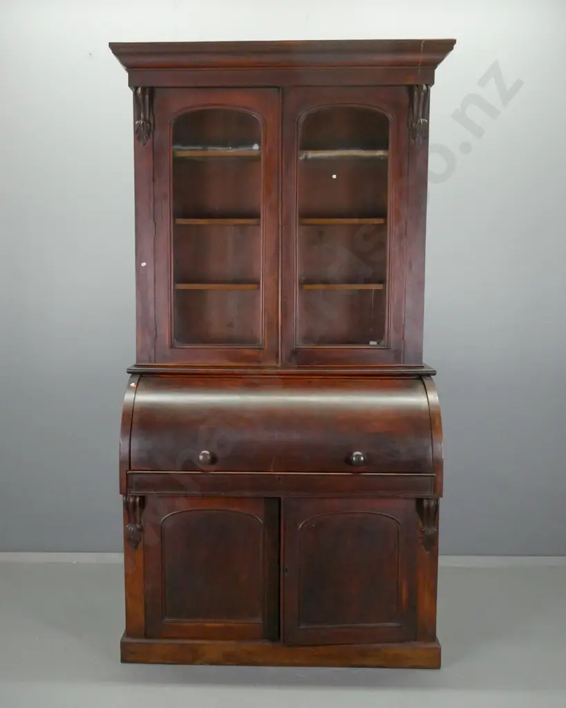 Victorian mahogany barrel top desk with fitted interior and 2 door glazed bookcase on top Image 1++