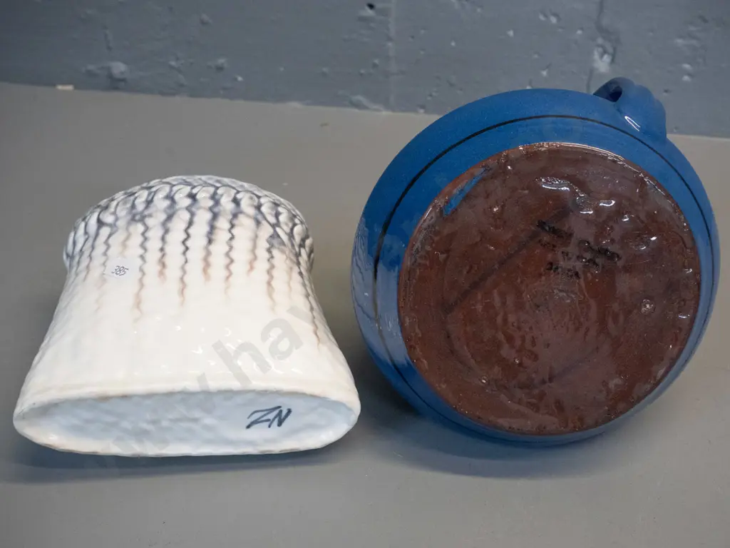 blue Torquay ware jug DF-170 at base and a NZ pottery (Studio Ceramics?) woven kite shaped vase H-130 Image 1++
